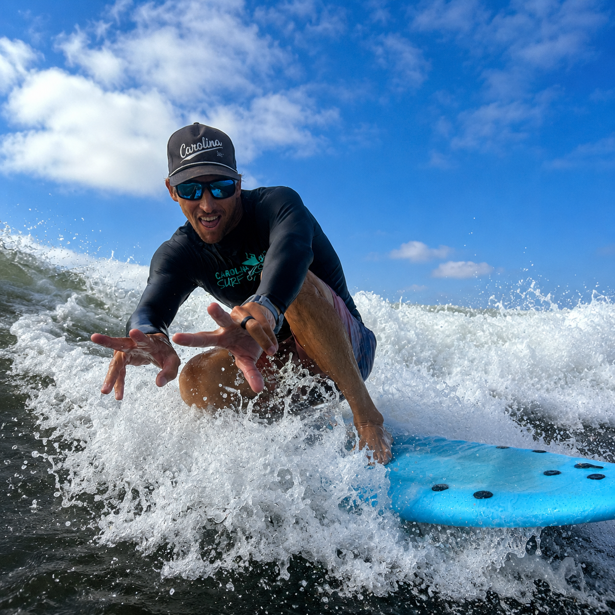 kyle busey catching a wave on folly beach
