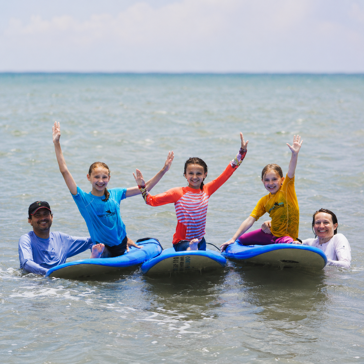 Kids enjoying waves and ocean activities at Charleston surf camp on Folly Beach