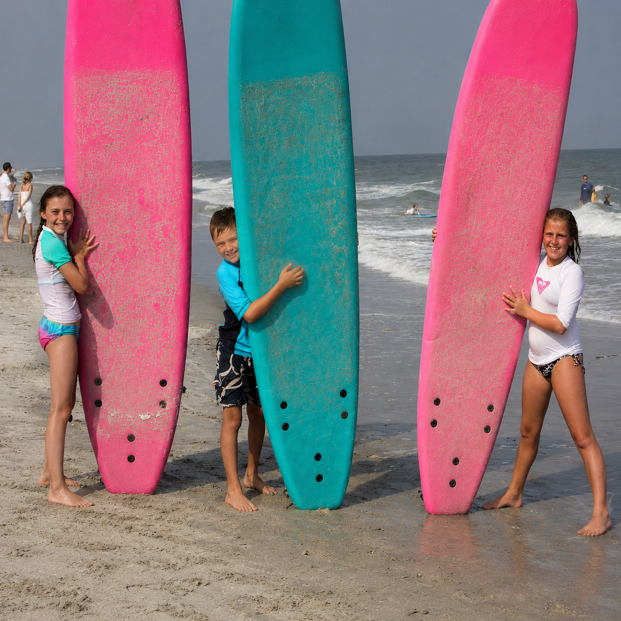 Group of young campers at Carolina Salt surf camp on Folly Beach, Charleston, SC, smiling